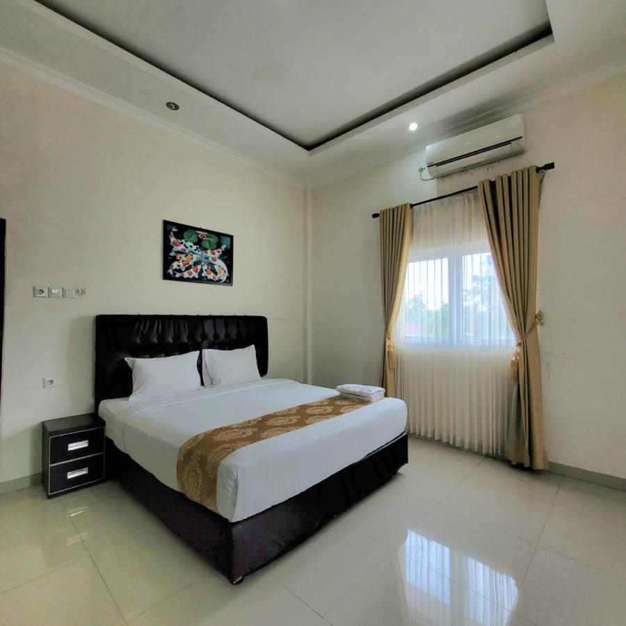 Mahakam Guest House パダン 部屋 写真