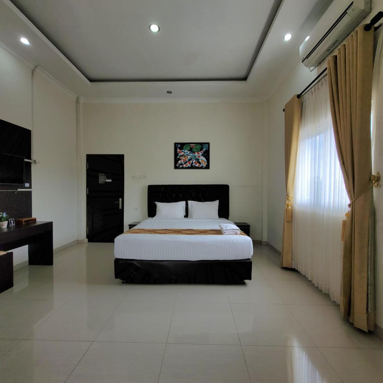 Mahakam Guest House パダン 部屋 写真