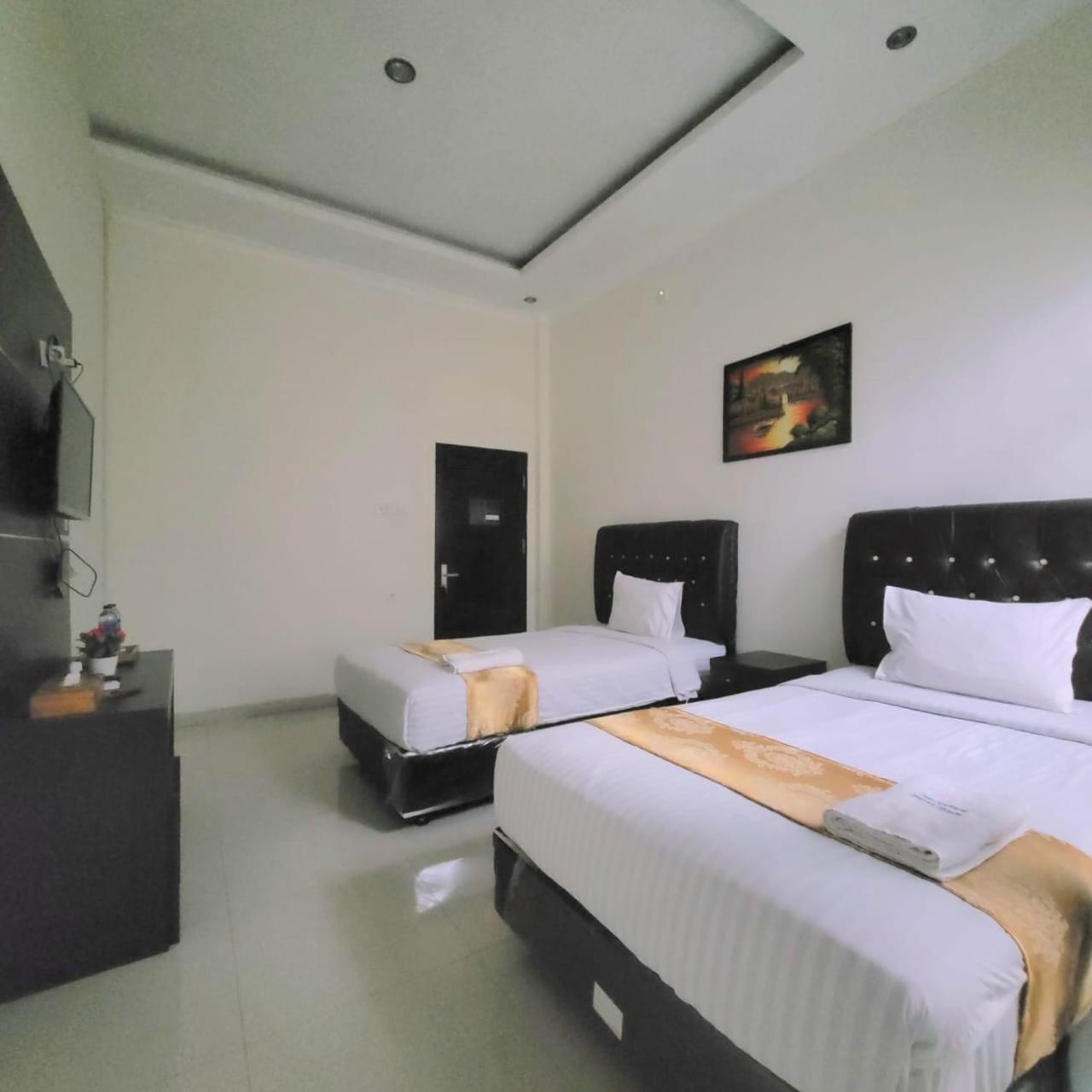 Mahakam Guest House パダン 部屋 写真
